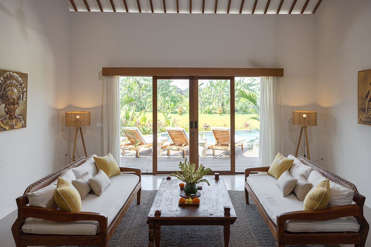 Gaia Room interior at luxury Bali retreat in Ubud – tropical decor, natural wood accents, serene setting, and private pool for a rejuvenating wellness getaway.