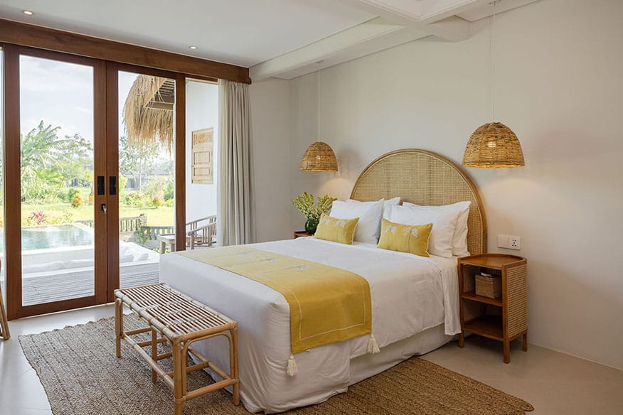 Gaia Room interior at luxury Bali retreat in Ubud – tropical decor, natural wood accents, serene setting, and private pool for a rejuvenating wellness getaway.