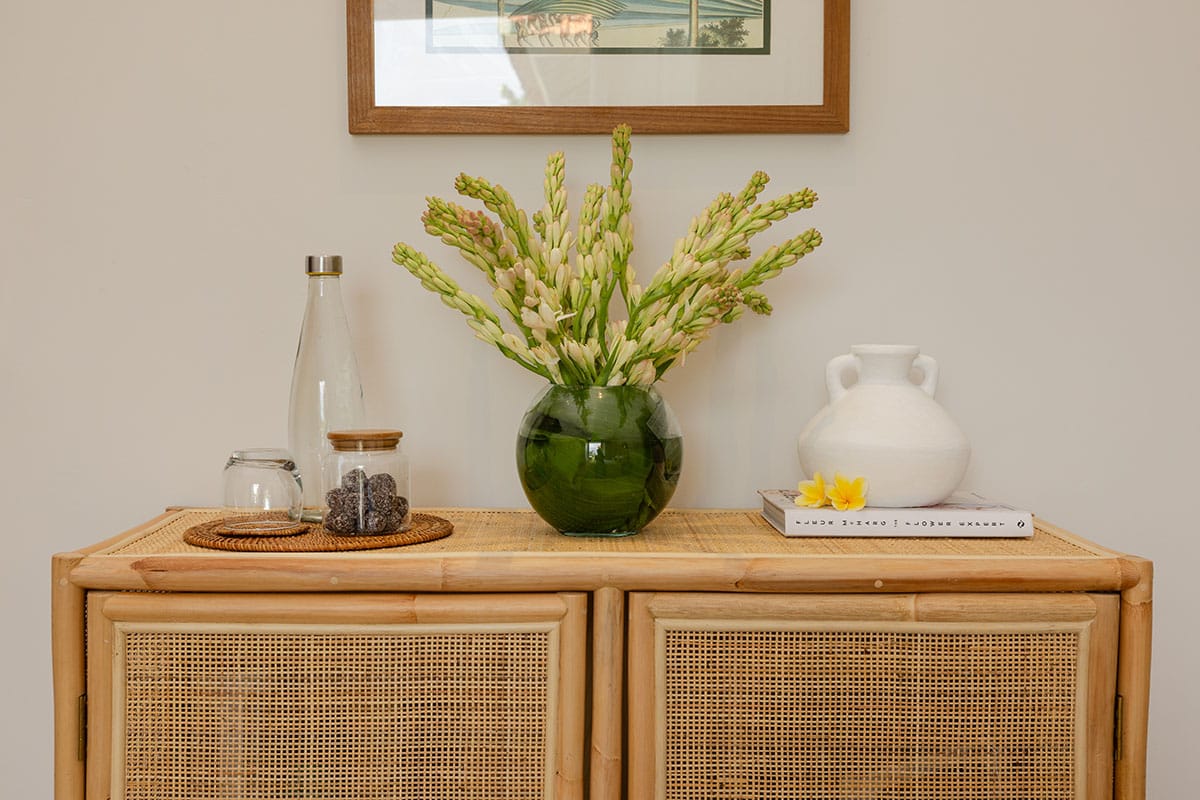 Interior view of the Gaia Room at a Bali retreat in Ubud, featuring serene decor and tranquil tropical surroundings.