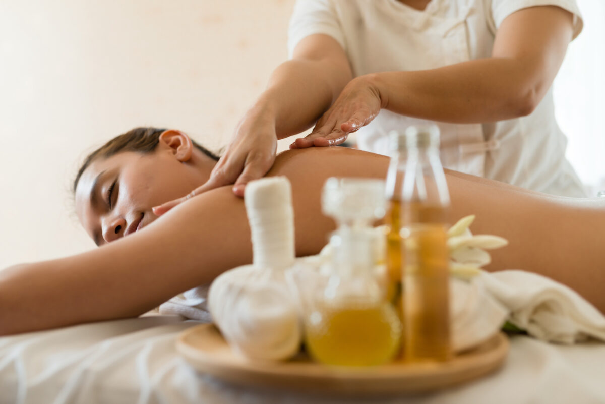 Relaxing spa massage at Goddess Retreats in Bali, offering rejuvenation and ultimate pampering amidst serene tropical surroundings