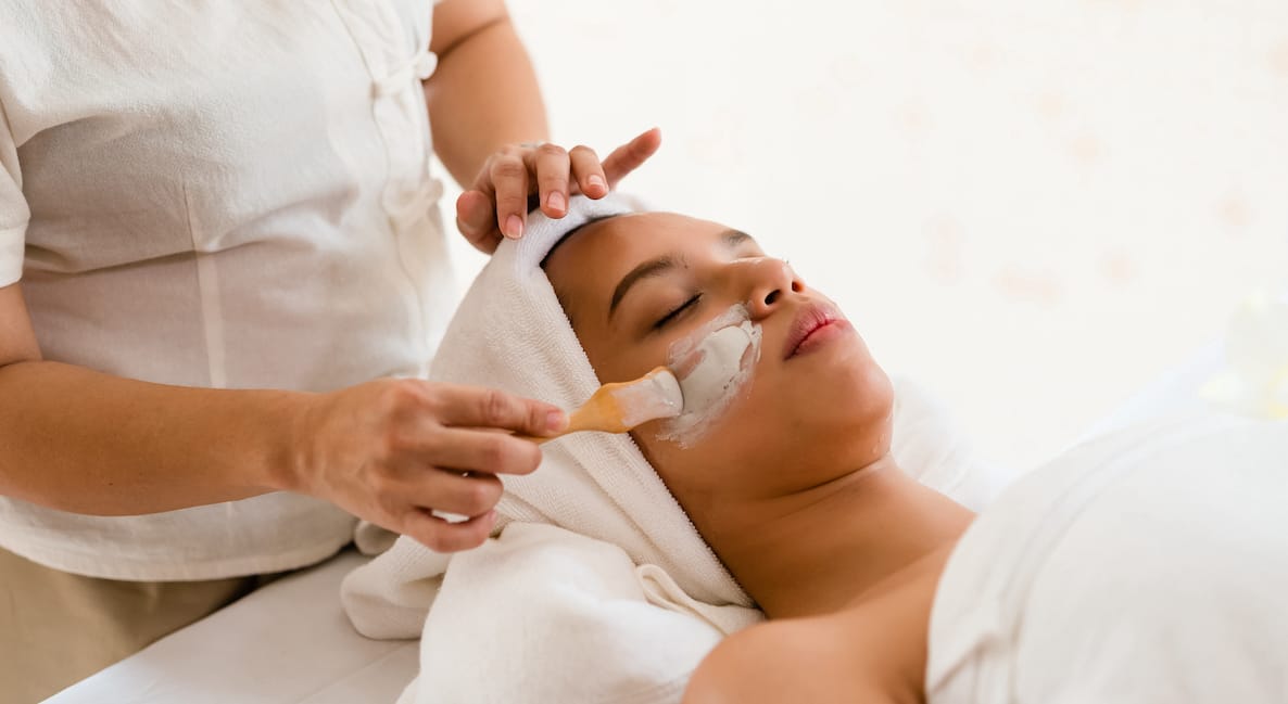 Relaxing spa treatment with a facial mask at a Bali Goddess Retreat, offering rejuvenation and wellness.