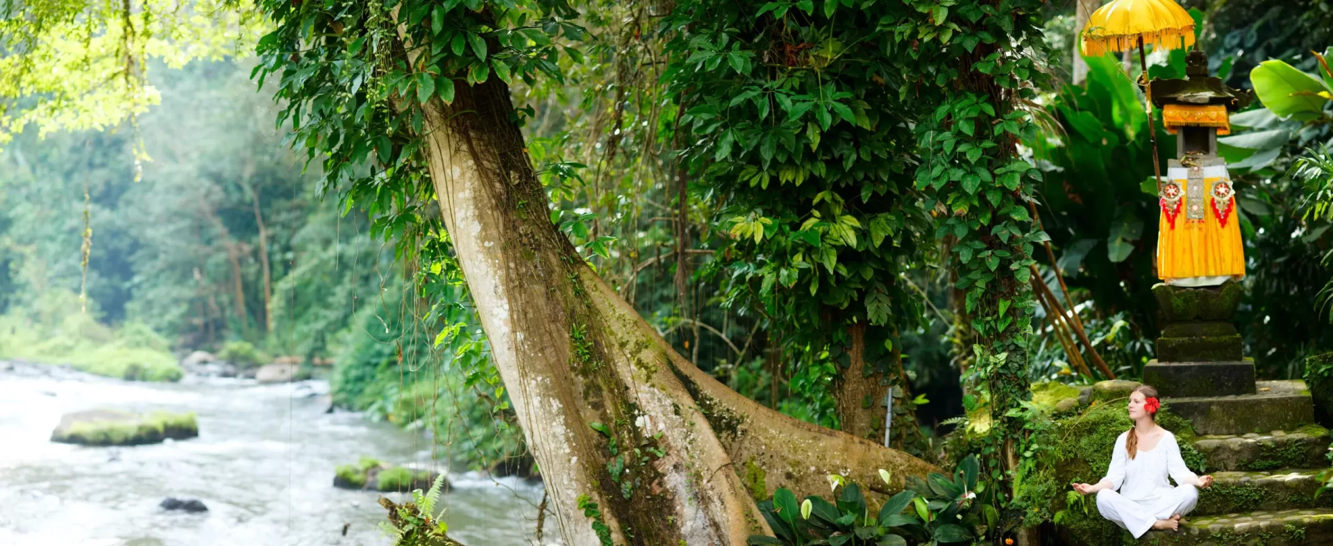 woman-yoga-sitting-by-river-bali